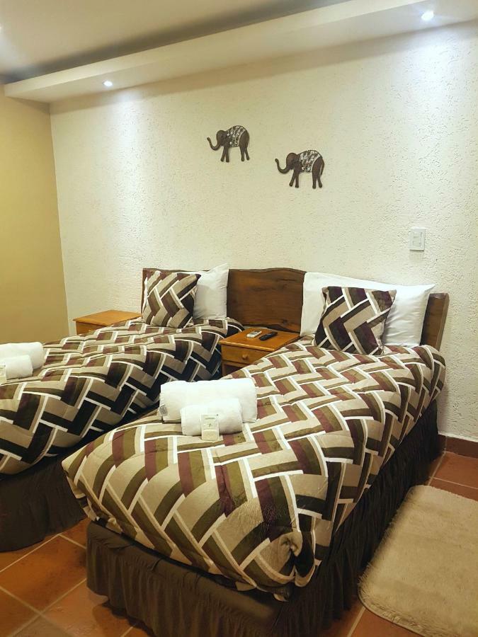 Ambay Suites & Dorms Puerto Iguazu Ngoại thất bức ảnh